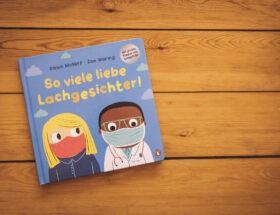 Das Buch-Cover von "So viele lieb Lachgesichter" zeigt zwei gezichente Menschen mit Maske, eine weiße Frau und einen Schwarzen Mann